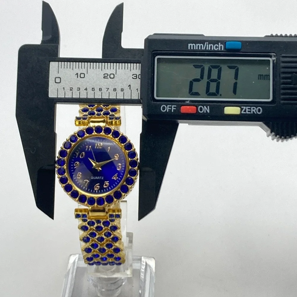 Modern Women's Watch 29mm Gold Tone Blue Crystals Bling Round New Battery 7.25